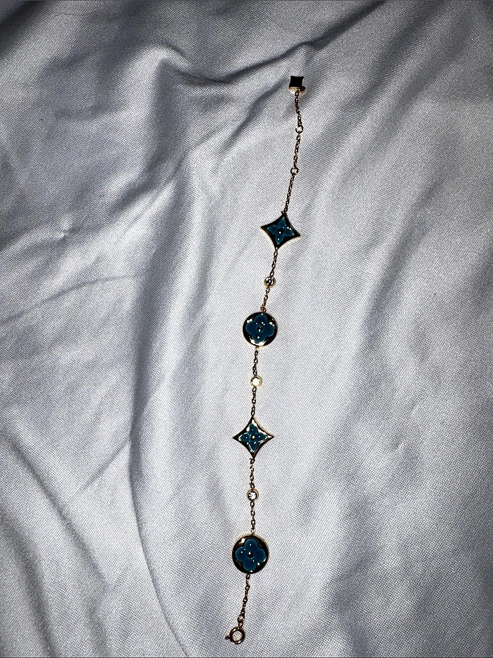 Inspired Gold tone & Blue Charm Bracelet